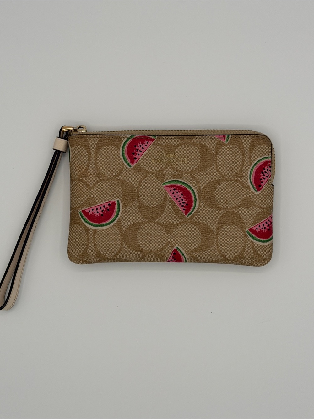 Coach Tan Signature Wristlet with Watermelon print